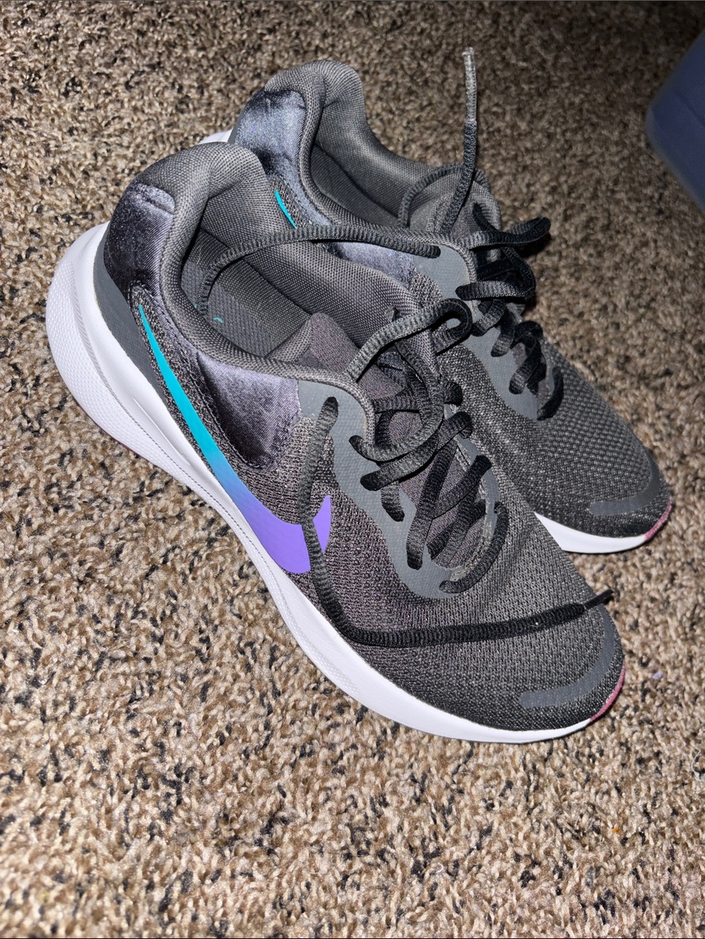 Nike Women's Gray Running Shoes with Purple and Teal Swoosh